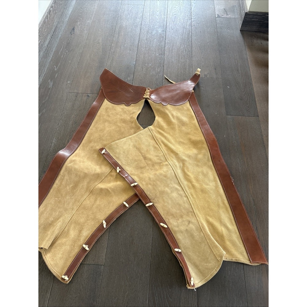 Rod's Suede Tooled Chaps feature a top section made of tooled leather